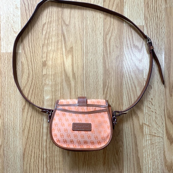 Dooney & Bourke Handbags - SOLD Dooney & Bourke peach D&B, logo crossbody bag